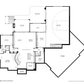 Drawing of a walkout basement in a custom home with sports court, bedrooms, gym, wet bar, and great room.